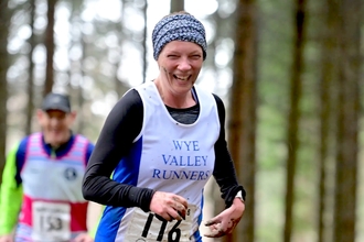 Muddy Wye Valley runner with big smile