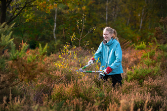 youth ranger doing practical conservation 