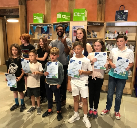 Group of children holding certificates